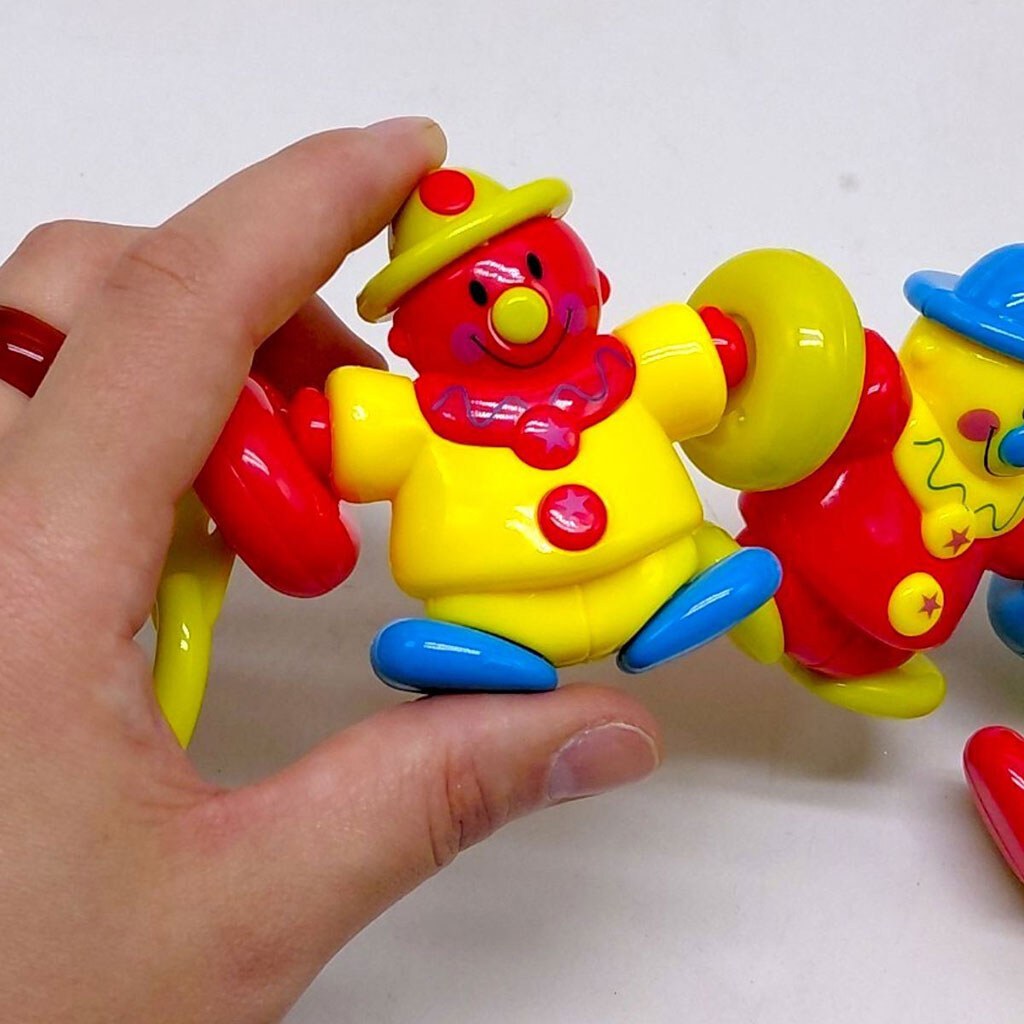 Погремушка на тележку "Клоуны", р.46x10x3 см, Yg Toys - № 2 Погремушка на тележку "Клоуны", р.46x10x3 см, Yg Toys - № 2